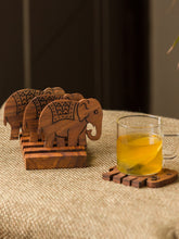 Load image into Gallery viewer, &#39;The Elephant Warriors&#39; Hand Carved Coasters With Stand In Sheesham Wood (Set of 4)

